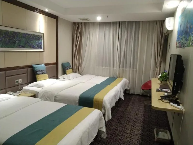 Bed in GreenTree Alliance Xinyang Pingqiao District Nanjing Road Dongyang Hotel