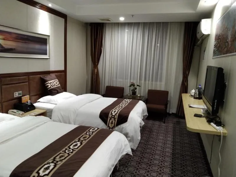 Bed in GreenTree Alliance Xinyang Pingqiao District Nanjing Road Dongyang Hotel