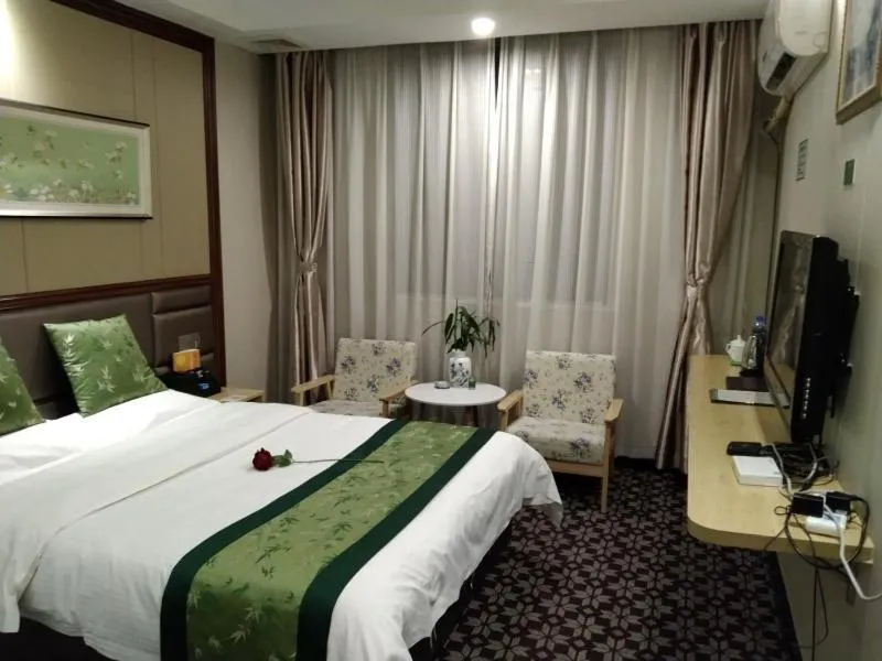 Bed in GreenTree Alliance Xinyang Pingqiao District Nanjing Road Dongyang Hotel