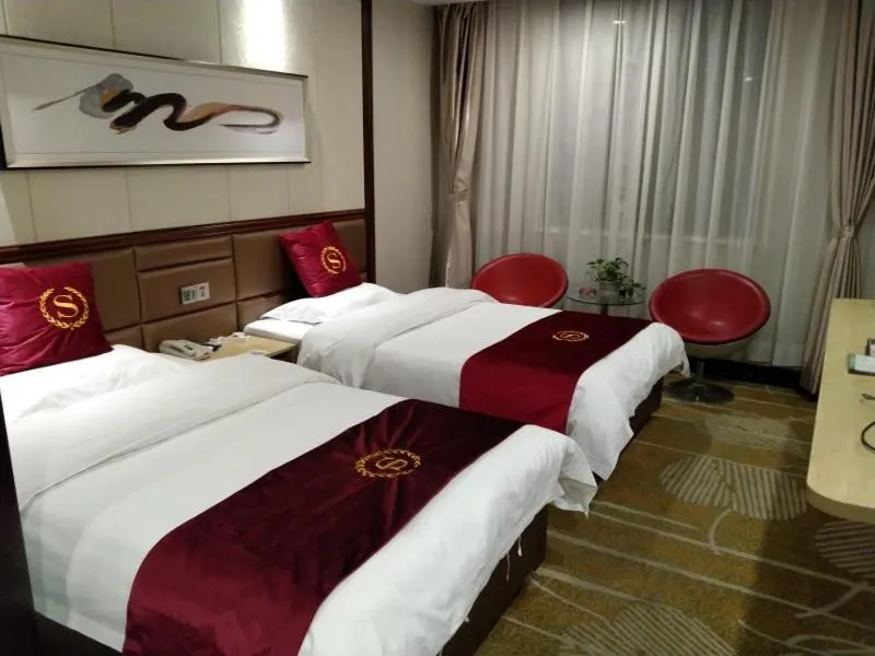 Bed in GreenTree Alliance Xinyang Pingqiao District Nanjing Road Dongyang Hotel