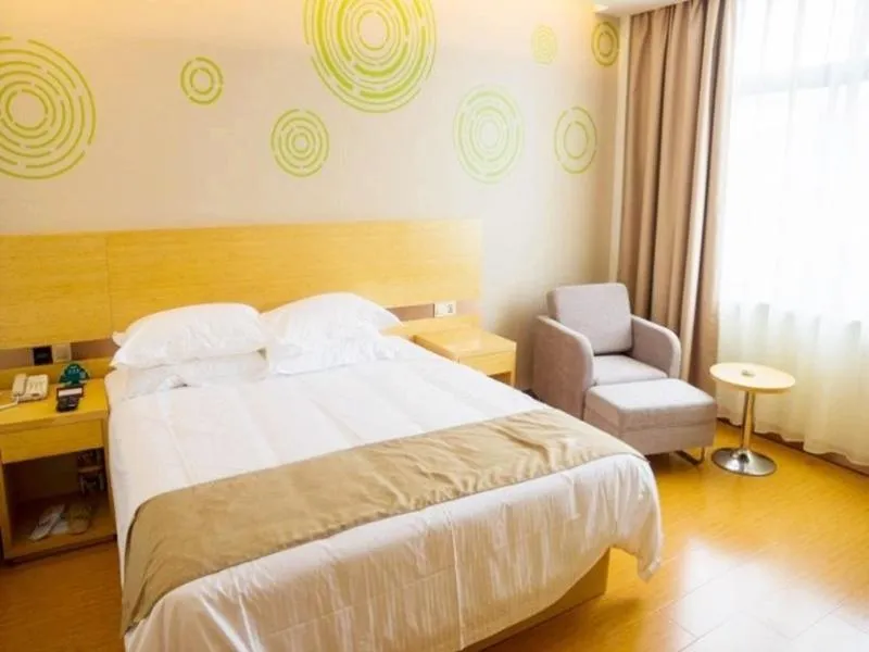 Bed in GreenTree Inn Nantong Qidong Binhai Industrial Park Nanhai RoadExpress Hotel