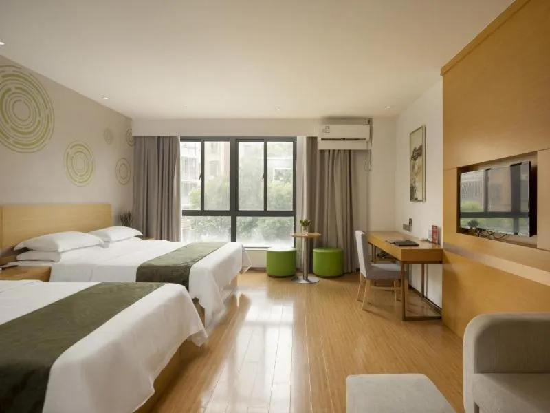 Bed in GreenTree Inn Wuxi Yixing Xushe Town Government Express Hotel