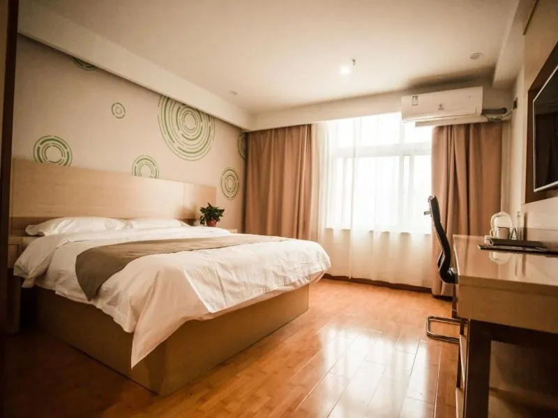 Bed in GreenTree Inn Heze Yucheng County Dongcheng International Business Hotel