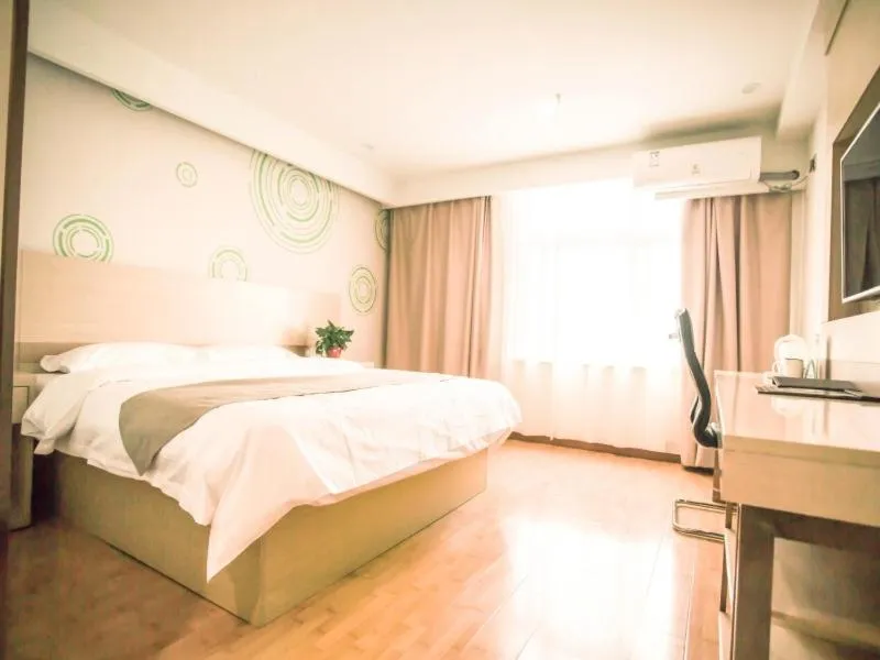 Bed in GreenTree Inn Heze Yucheng County Dongcheng International Business Hotel