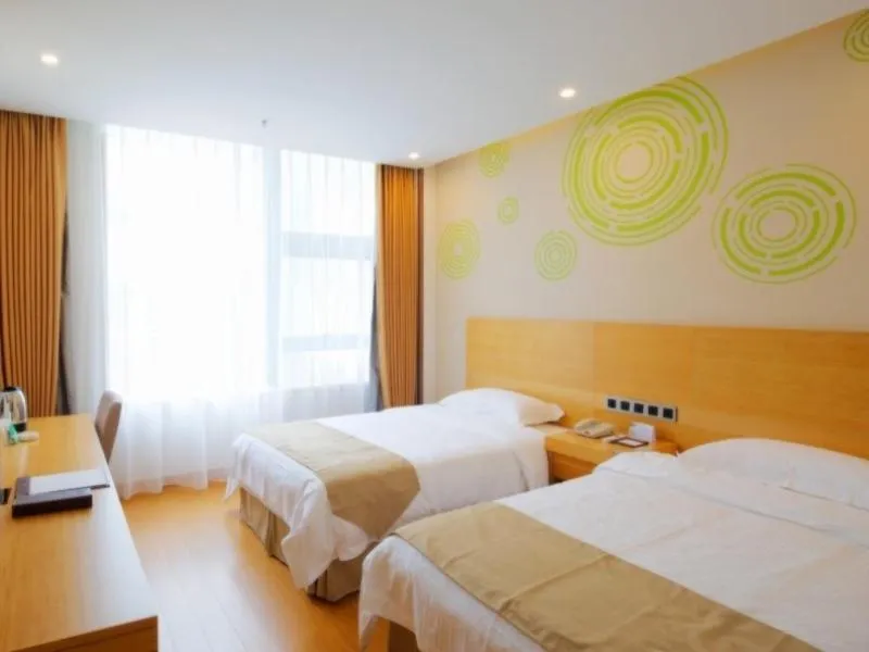 Bed in GreenTree Inn Heze Yucheng County Dongcheng International Business Hotel