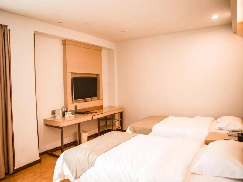 Bed in GreenTree Inn Heze Yucheng County Dongcheng International Business Hotel