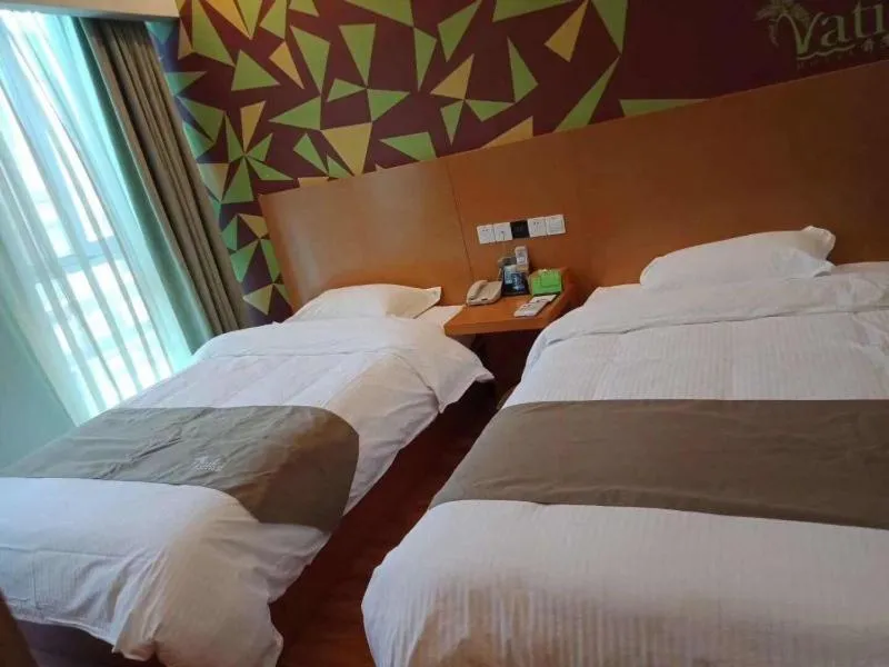 Bed in Vatica Jieshou City New Passenger Transport Center Hotel