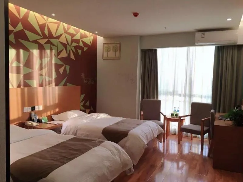 Bed in Vatica Jieshou City New Passenger Transport Center Hotel