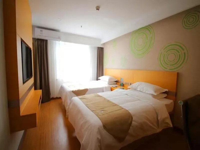 Bed in GreenTree Inn Handan City Wu'an City Plaza Business Hotel