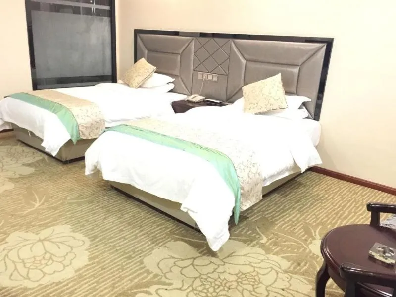 Bed in GreenTree Alliance Bengbu Railway Station Hotel