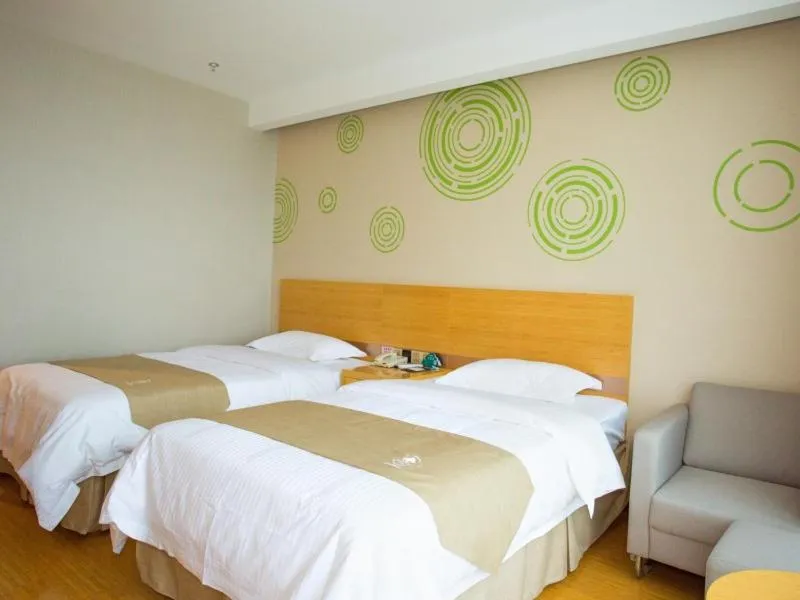 Bed in GreenTree Inn Nantong Rugao Jiang'an Town Xin Jiang An Square Hotel