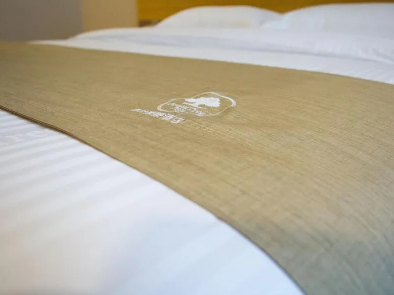 Bed in GreenTree Inn Nantong Rugao Jiang'an Town Xin Jiang An Square Hotel