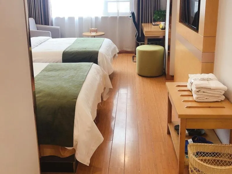 Bed in GreenTree Inn Xinyang Gushi County Yucheng Avenue Express Hotel