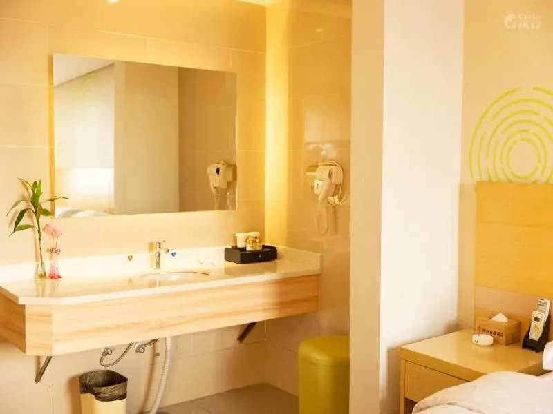 Bed in GreenTree Inn Xinyang Gushi County Yucheng Avenue Express Hotel