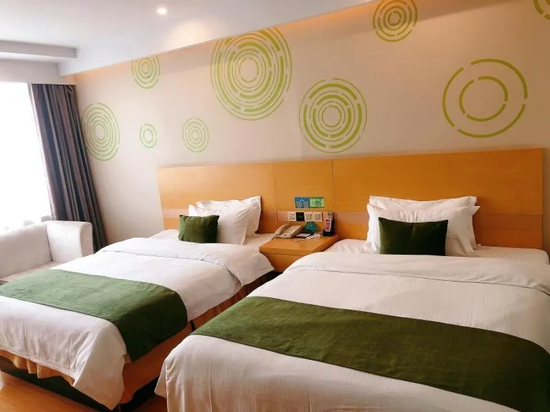 Bed in GreenTree Inn Xinyang Gushi County Yucheng Avenue Express Hotel