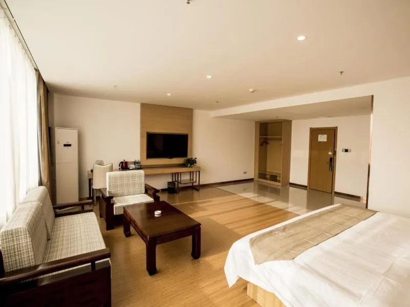 Bed in GreenTree Inn Handan Wei County Xianbiao Business Hotel