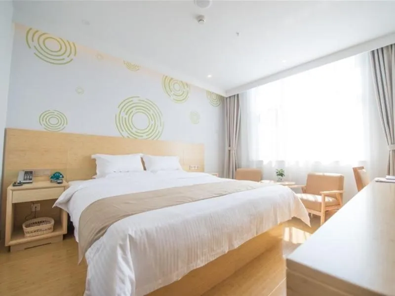 Bed in GreenTree Inn Langfang City Wen'an County Beach Town Anzu Road Business Hotel