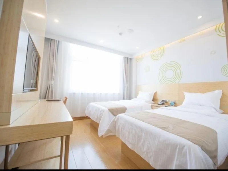 Bed in GreenTree Inn Langfang City Wen'an County Beach Town Anzu Road Business Hotel
