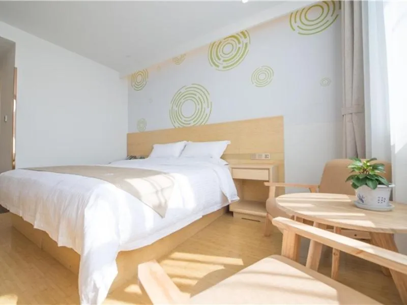 Bed in GreenTree Inn Langfang City Wen'an County Beach Town Anzu Road Business Hotel