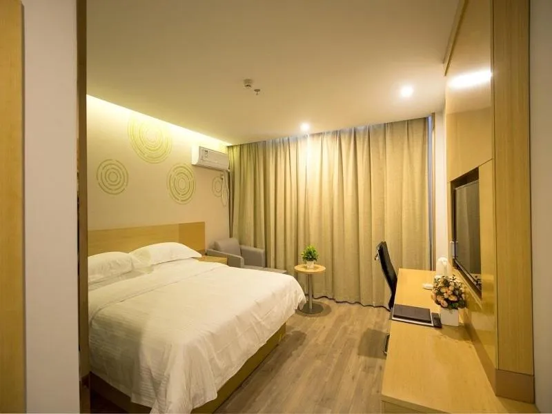 Bed in GreenTree Inn Zhenjiang Danyang City Danbei Town Xinqiao Business Hotel