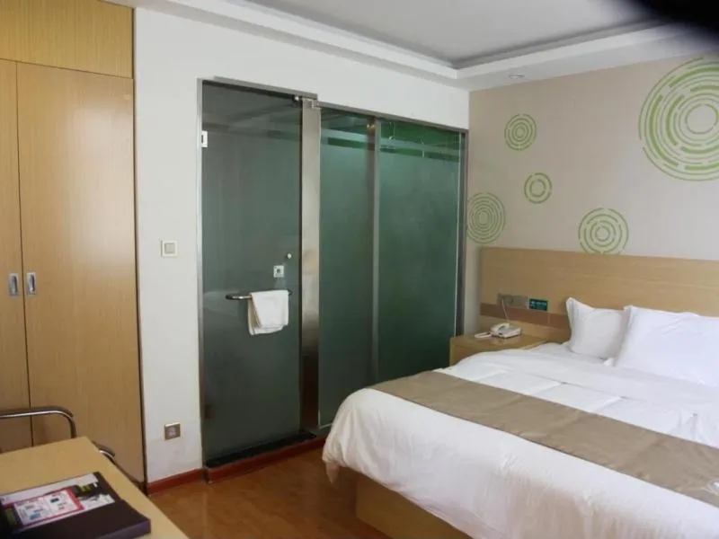 Bed in GreenTree Inn Zaozhuang High Speed Rail Station Express Hotel