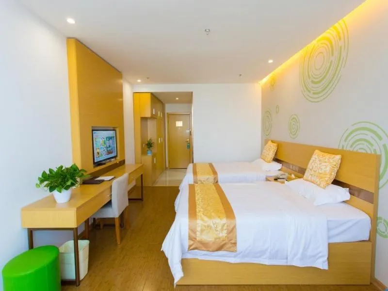 Bed in GreenTree Inn Cixi Zhouxiang Town Jiayue Plaza Business Hotel