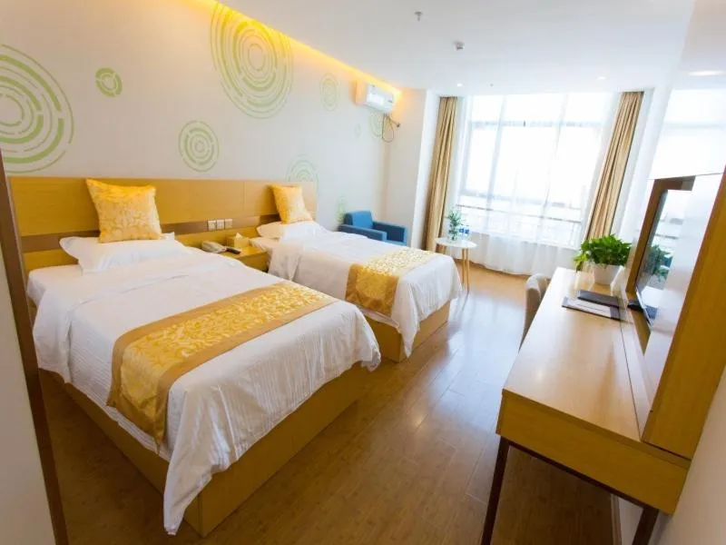 Bed in GreenTree Inn Cixi Zhouxiang Town Jiayue Plaza Business Hotel