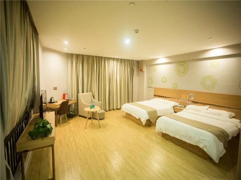 Bed in GreenTree Inn Zhoushan Baiquan Colorful Plaza Express Hotel