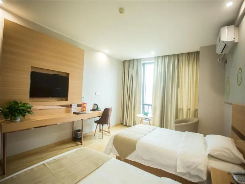 Bed in GreenTree Inn Zhoushan Baiquan Colorful Plaza Express Hotel