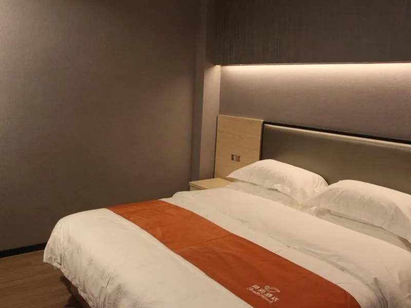 Bed in Shell Shanghai Chedun Yingshi City Yingshi Road Hotel