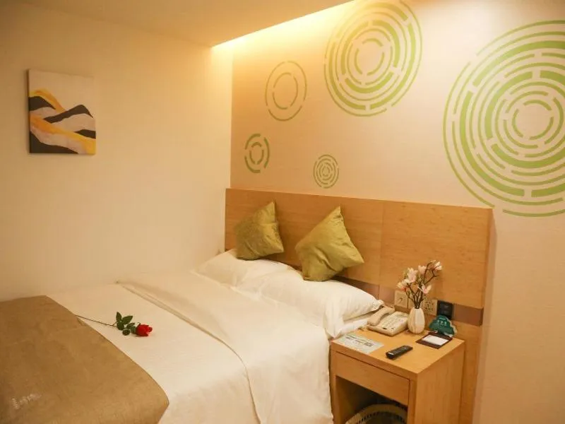 Bed in GreenTree Inn Nanjing Pukou District Qiaolin Express Hotel
