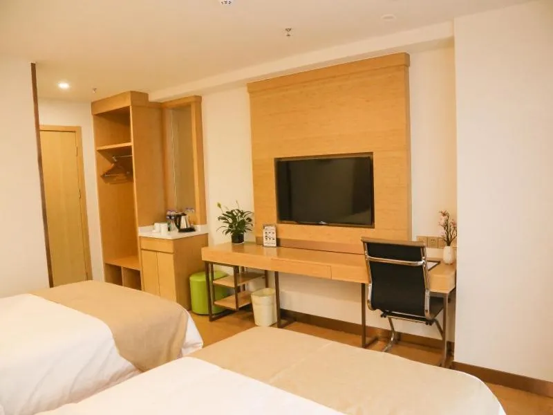 Bed in GreenTree Inn Nanjing Pukou District Qiaolin Express Hotel