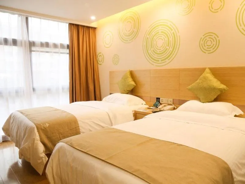 Bed in GreenTree Inn Nanjing Pukou District Qiaolin Express Hotel