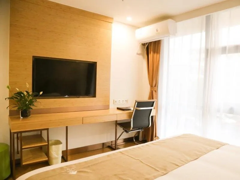 Bed in GreenTree Inn Nanjing Pukou District Qiaolin Express Hotel