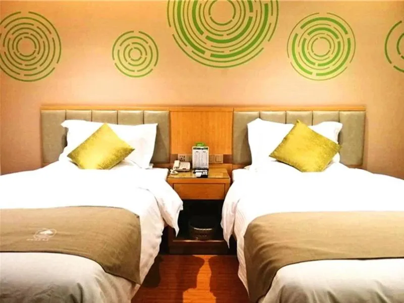 Bed in GreenTree Inn Xingtai Julu County Fengqing Road Business Hotel