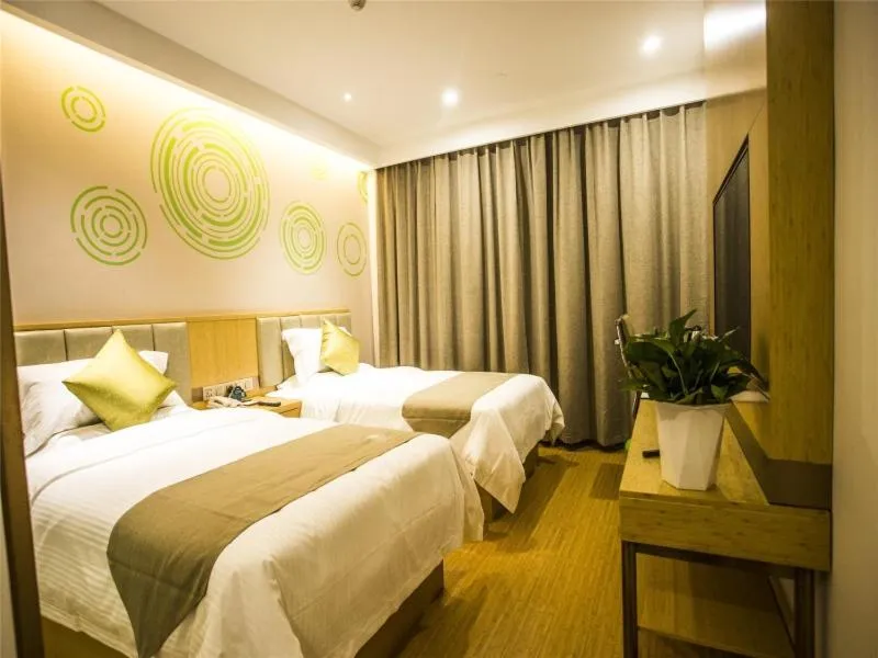 Bed in GreenTree Inn Xingtai Julu County Fengqing Road Business Hotel