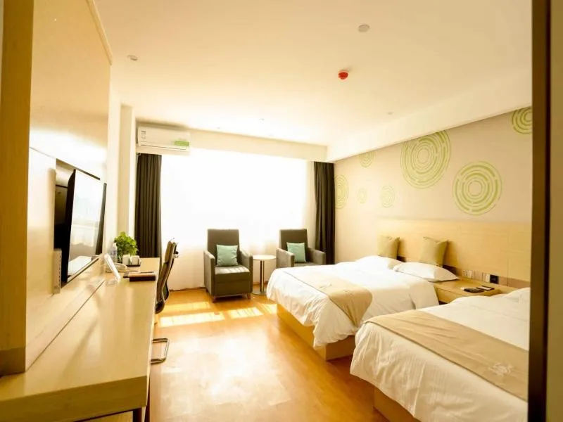 Bed in GreenTree Inn Xuzhou Economic Development Zone Da Miaozhen Business Hotel
