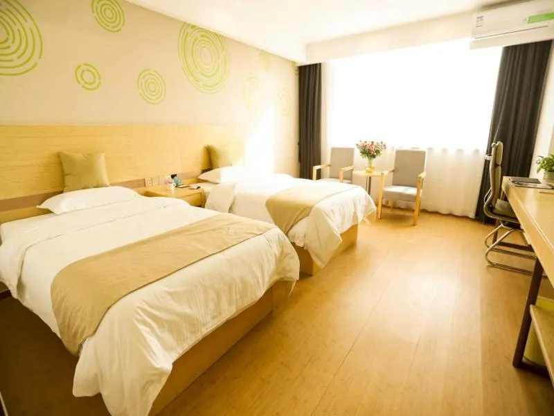 Bed in GreenTree Inn Xuzhou Economic Development Zone Da Miaozhen Business Hotel