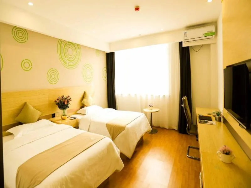 Bed in GreenTree Inn Xuzhou Economic Development Zone Da Miaozhen Business Hotel