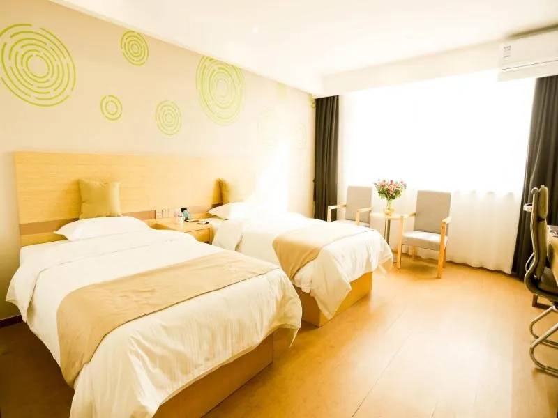 Bed in GreenTree Inn Xuzhou Economic Development Zone Da Miaozhen Business Hotel