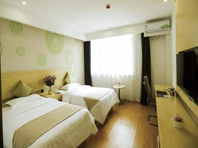 Bed in GreenTree Inn Xuzhou Economic Development Zone Da Miaozhen Business Hotel