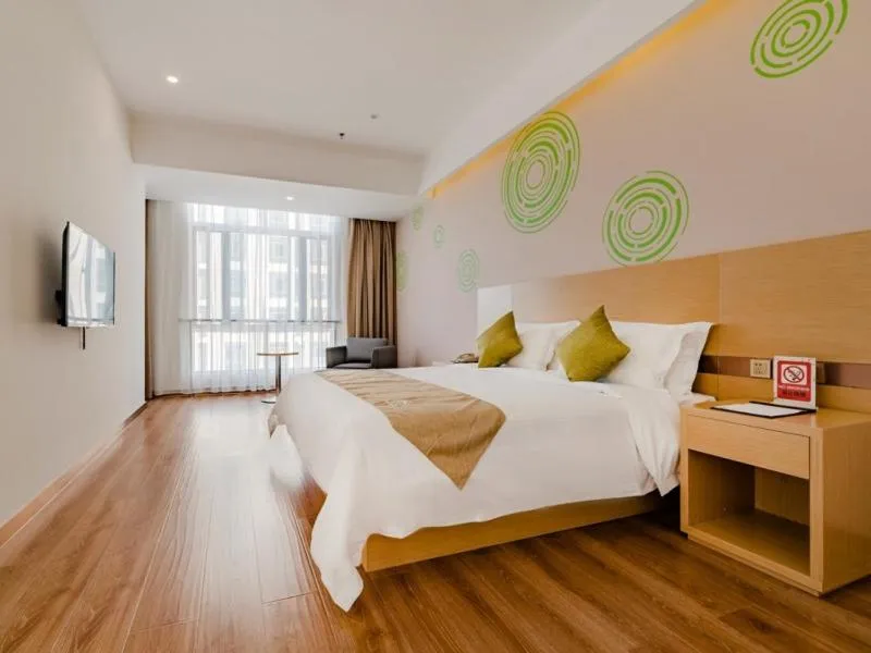 Bed in GreenTree Inn Taian High-speed Railway Station Lingshan Avenue Business Hotel