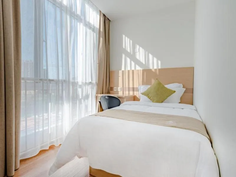 Bed in GreenTree Inn Taian High-speed Railway Station Lingshan Avenue Business Hotel