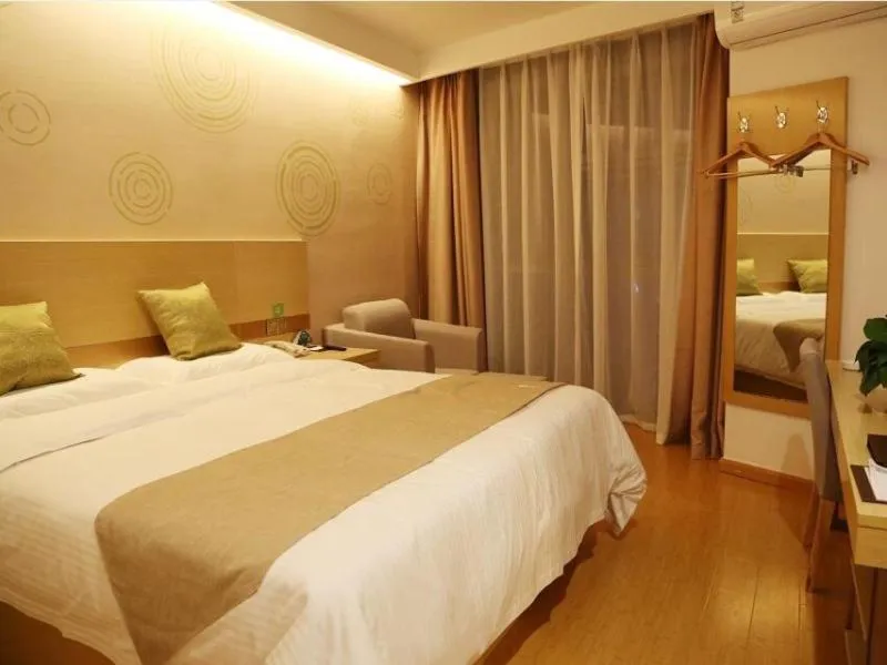 Bed in GreenTree Inn Wuxi Jiangyin City Ligang Town Chenshu Road Express Hotel