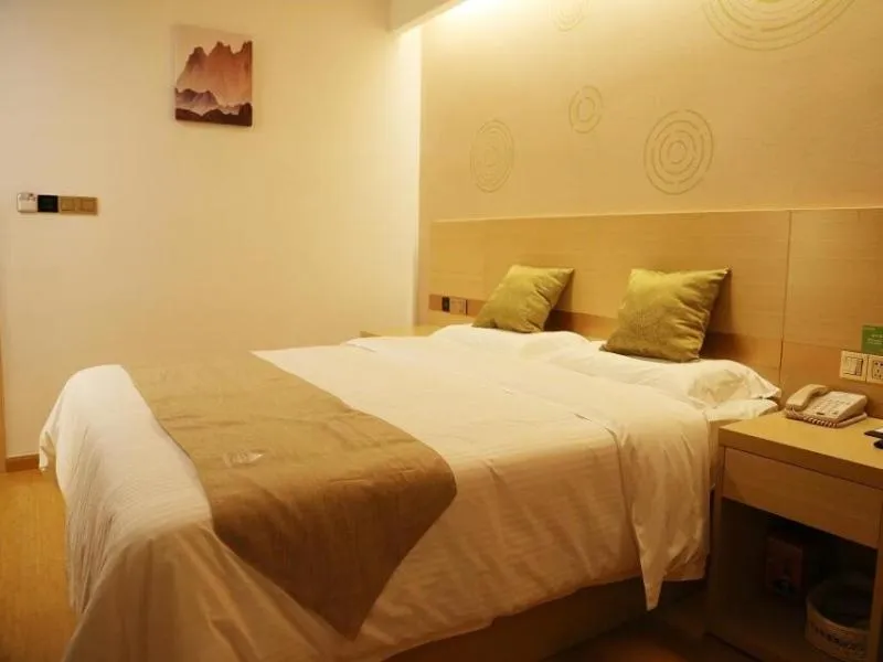 Bed in GreenTree Inn Wuxi Jiangyin City Ligang Town Chenshu Road Express Hotel