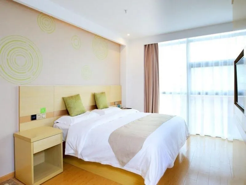 Bed in GreenTree Inn Wuxi Jiangyin City Ligang Town Chenshu Road Express Hotel