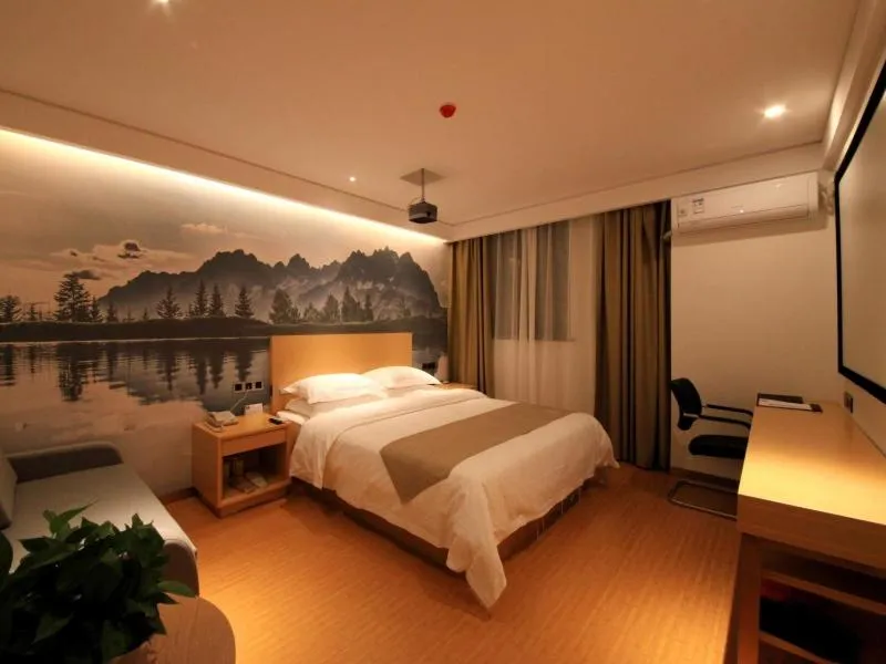 Bed in GreenTree Inn Zhengzhou Gongyi Xinxing Road Business Hotel