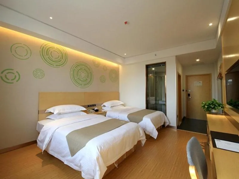 Bed in GreenTree Inn Zhengzhou Gongyi Xinxing Road Business Hotel