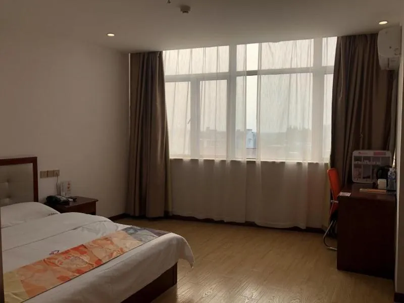 Bed in Shell Shanghai Jinshan Zhanyan Songjin Highway Hotel