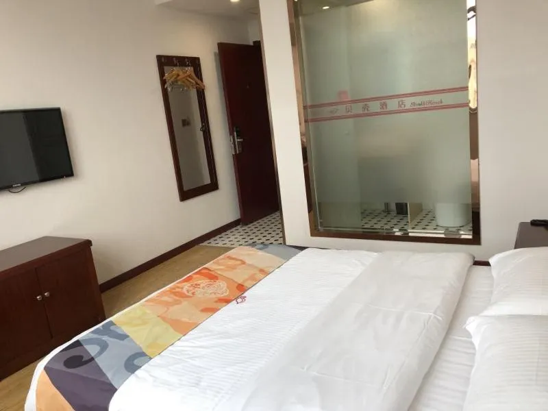 Bed in Shell Shanghai Jinshan Zhanyan Songjin Highway Hotel